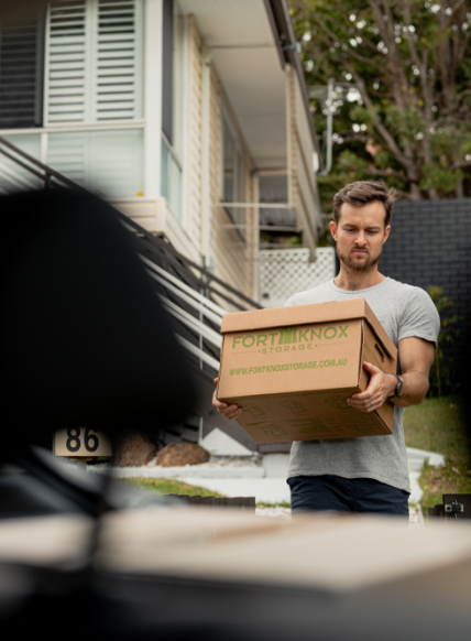 DSC_6901 A person carrying a Fort Knox Storage box