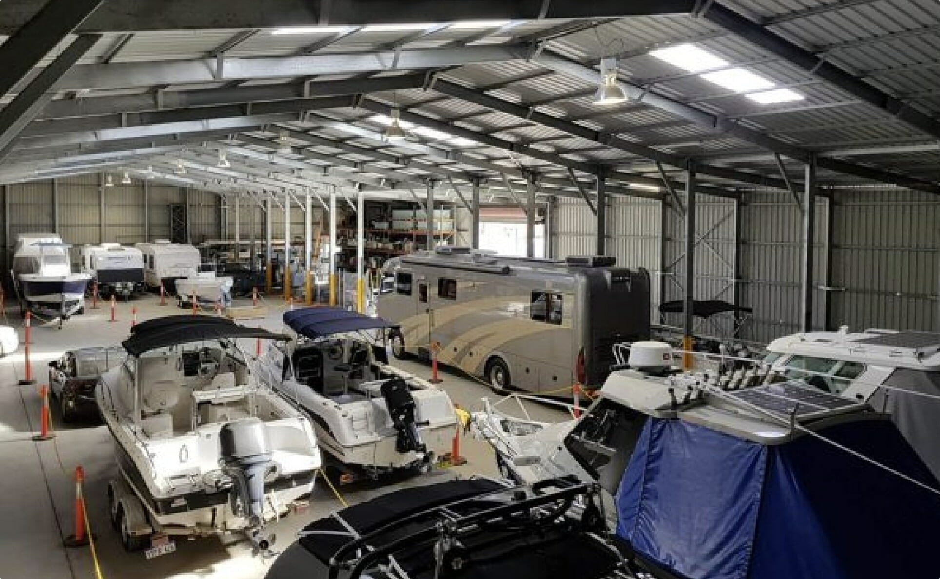 Multiple vehicles parked within a storage facility