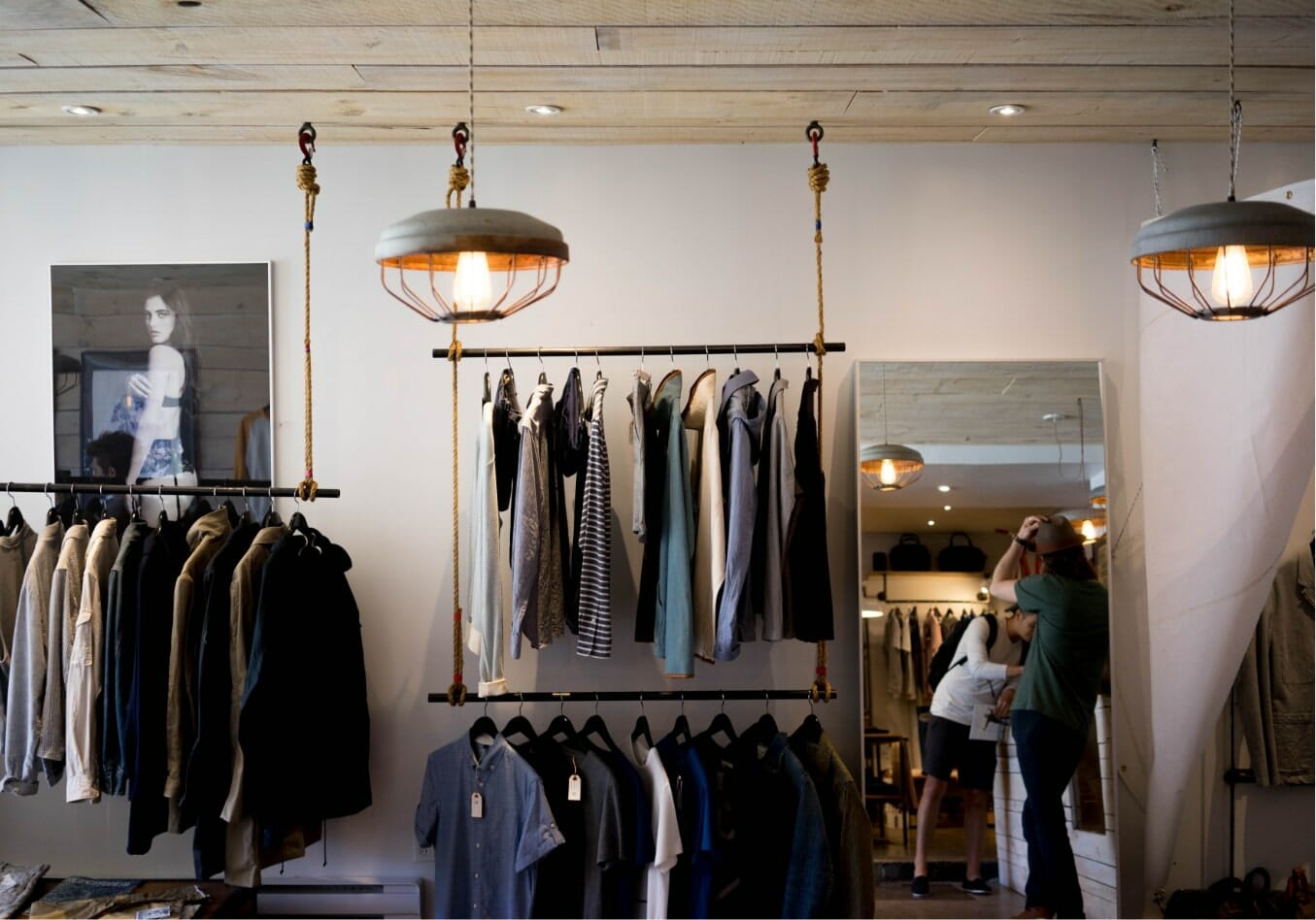 Clothes hanging on clothing racks