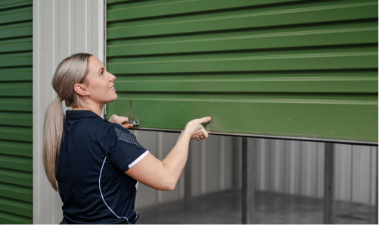Fort Knox storage employee opening a storage unit