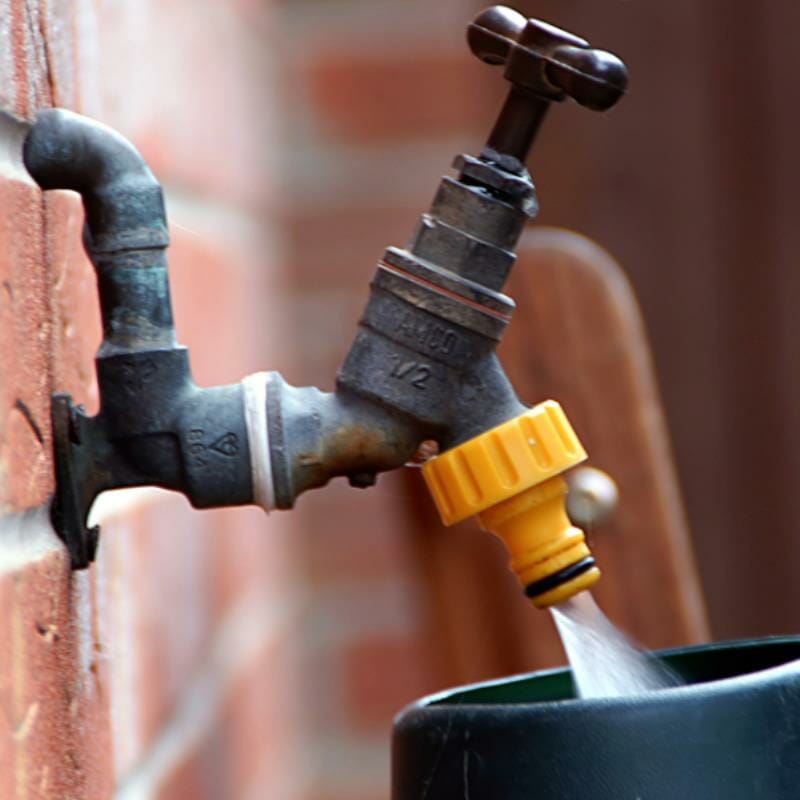 A water faucet pouring water
